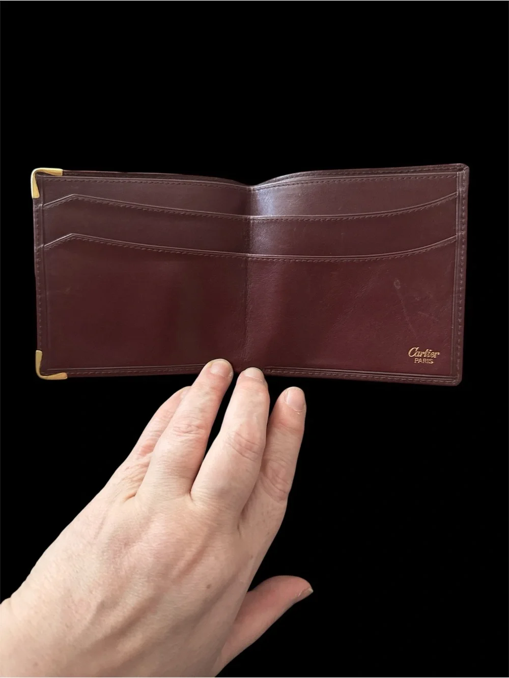 Cartier Burgundy Leather Bi-Fold Wallet with Gold Corner Hardware